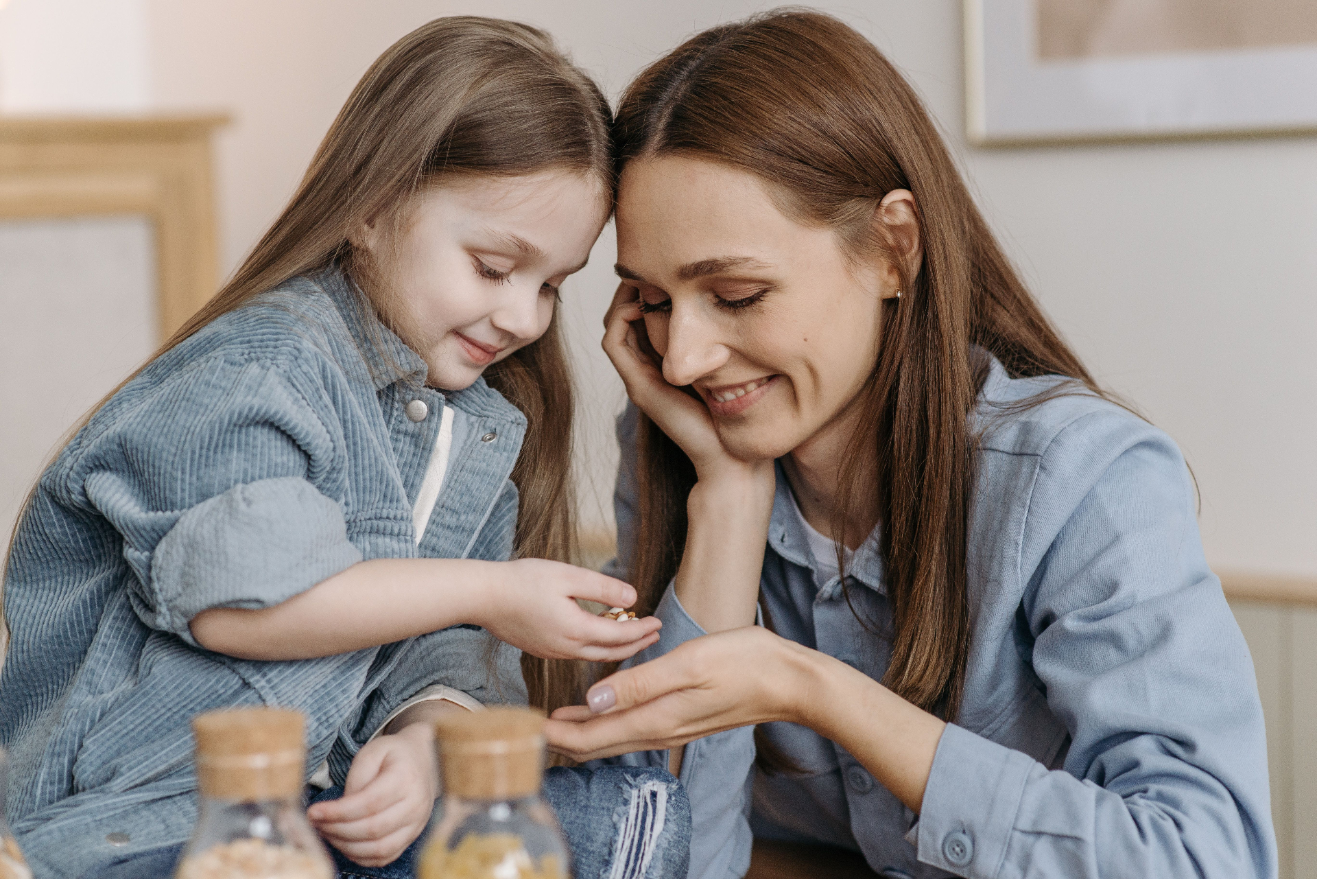 Mother and daughter sharing a gentle moment together
